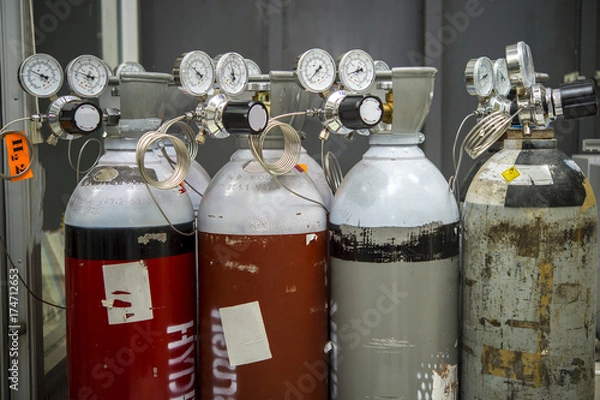 Fototapeta Gas pressure regulator with gas Nitrogen , Oxygen, Helium, Hydrogen.Gas used on the machine Gas Chromatograph-Mass Spectrometer (GCMS).Close up image