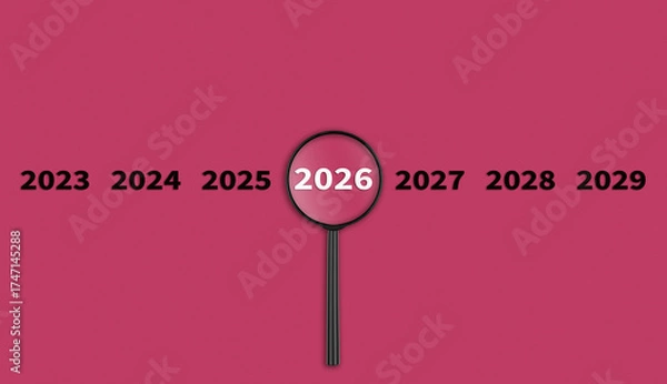 Fototapeta Lens, magnifying glass focusing on the year 2026 on a red background. Financial or stock market strategies and past and future events.