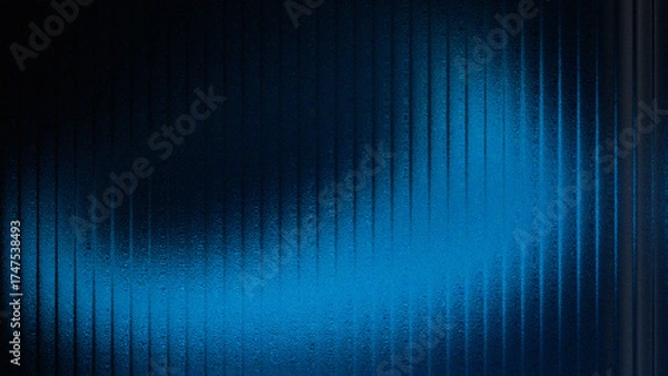 Fototapeta Abstract glowing blue light streaks against a dark background creating a futuristic and dynamic visual effect