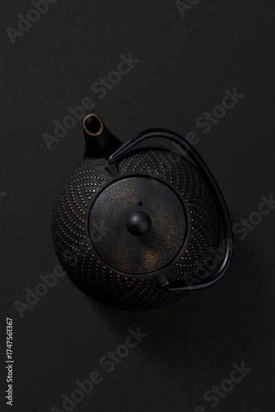 Obraz Metal teapot on dark background