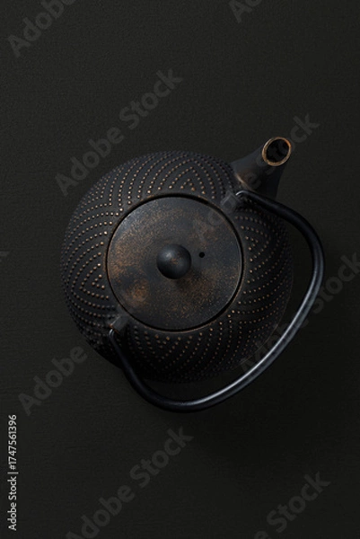 Obraz Metal teapot on dark background