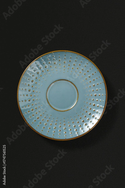 Obraz Ceramic plate on dark background