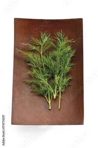 Fototapeta Dill (Anethum graveolens) in a wooden bowl