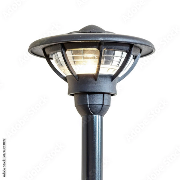 Obraz Outdoor lamp post emitting warm light against a at nighttime