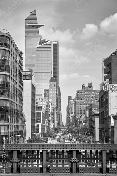 Fototapeta Street impressions of New York, view from the Highline towards the Edge Tower, black and white photo