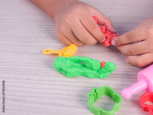 Fototapeta child play modeling clay