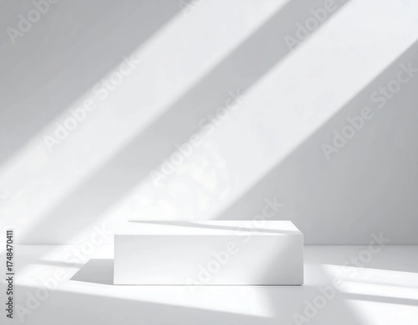 Fototapeta White minimalist product display podium illuminated by sunlight