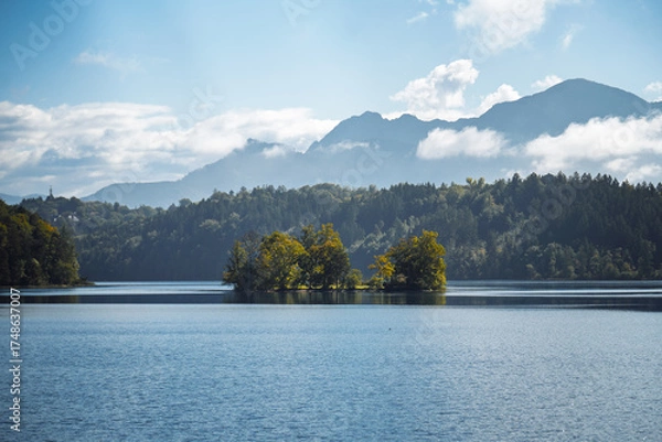 Obraz Tranquil islet "Kleine Birke" on serene Lake Staffelsee in autumn light with the Bavarian Alps in the background, perfect for travel promotion in "Blaues Land" and Werdenfels.