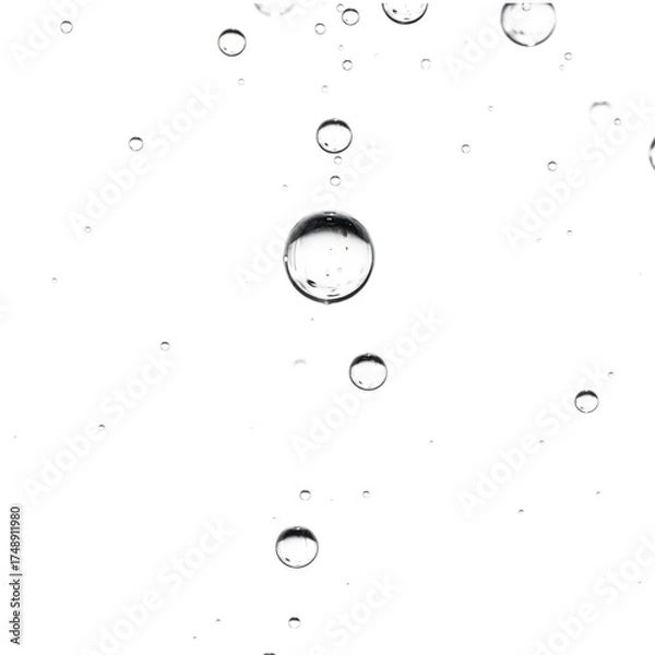 Fototapeta A minimalist macro view of clear air bubbles floating in a transparent serum or gel, isolated on a clean white background for a scientific or cosmetic concept
