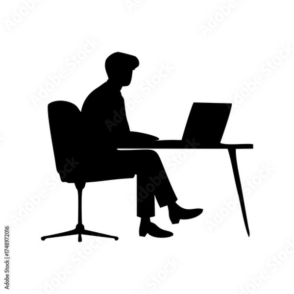 Fototapeta SILHOUETTE OF A MAN IN A SUIT SITTING ON A CHAIR WITH A LAPTOP ON A DESK