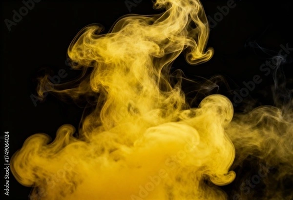 Fototapeta Dense plumes of vibrant yellow smoke create a dramatic and artistic display against a deep black background.

