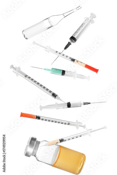 Fototapeta essential photograph of medical syringes, vials, and ampoules scattered randomly, representing vaccination, drug delivery, and healthcare essentials against a deep transparent background.
