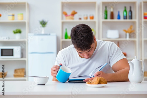 Fototapeta Man falling asleep during his breakfast after overtime work