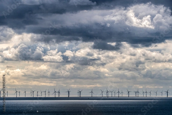 Obraz Offshore wind farm under a heavy sky