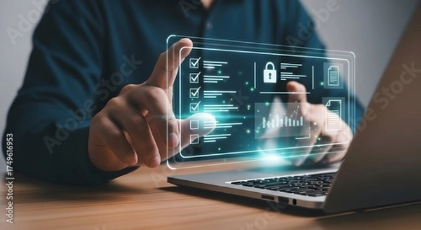 Fototapeta Person interacting with a futuristic holographic interface displaying security icons and data on a laptop