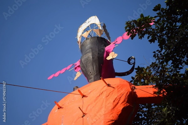 Fototapeta Ravnans being ignited during Dussehra festival at ramleela ground in Delhi, India, Big statue of Ravana to get fire during the Fair of Dussera to celebrate the victory of truth by Lord Rama