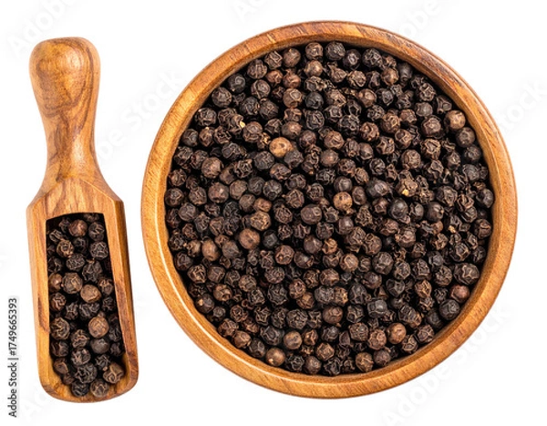 Obraz Wooden bowl and scoop filled with whole black peppercorns. Overhead view