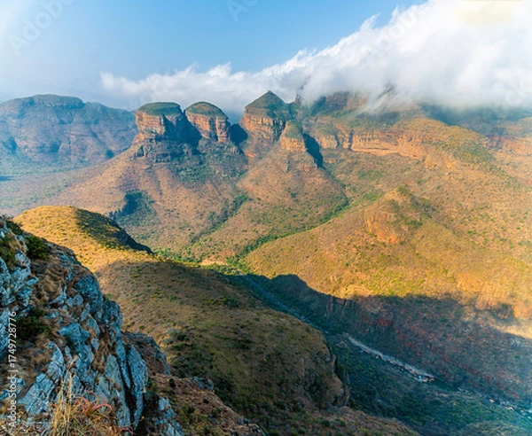Fototapeta A view down into Blyde River Canyon towards the three Rondavels,  Mpumalanga, South Africa in Springtime