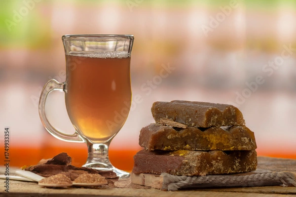 Fototapeta Traditional Colombian drink made from panela and lemon Colombian culture