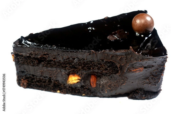 Obraz Fudge cake slice topped with a chocolate ball, a chocolate cake with a consistency, flavor, or richness reminiscent of fudge, a cake flavored with melted chocolate, cocoa powder