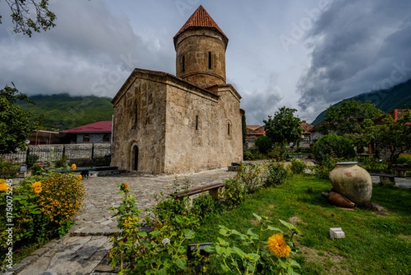 Fototapeta Kish Albanian Church and garden in Shaki, Azerbaijan