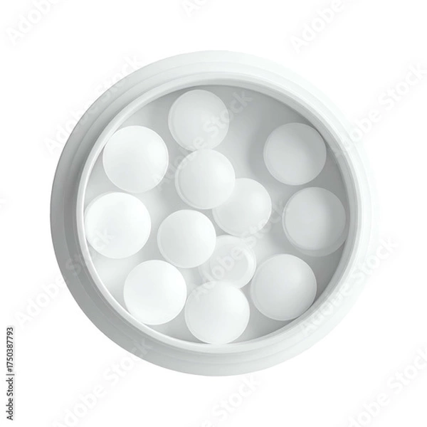 Fototapeta Top-down view of a white, cylindrical container filled with spherical, white tablets
