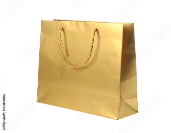 Fototapeta Gleaming golden paper shopping bag, isolated, featuring rope handles, against black
