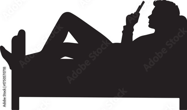 Fototapeta Silhouette of person reclining on sofa using mobile phone