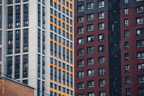 Fototapeta mirrored windows of the facade of an office building