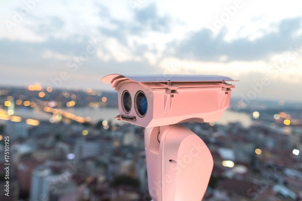 Fototapeta Security camera detects the movement of traffic and terrorist threat. The concept of security and the prevention of terrorism