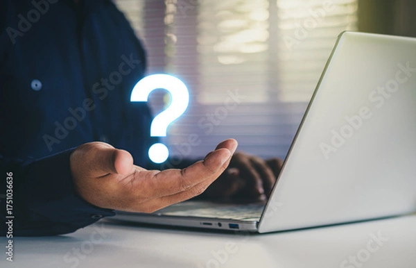 Fototapeta Question mark floating on hand, International ask a question day concept, Answer, Q&A, Problem, solution, confusion counseling, businessperson using laptop search for answers