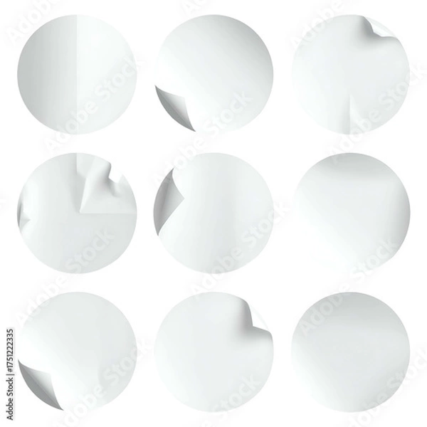 Obraz Nine circular white blank stickers, some with curled corners, against a black background