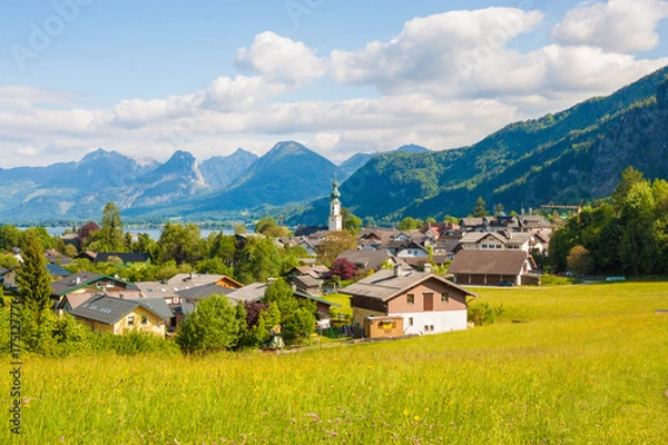 Obraz Beautiful view of green alpine meadow and mountain village St. Gilgen, Salzkammergut,  Austria.