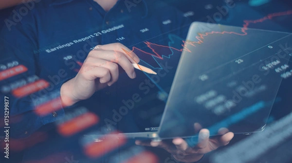Obraz Man analyzing red financial charts on a tablet, indicating market downturn or correction, with data overlay and digital graphics.