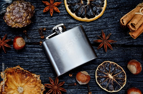 Obraz metallic bottle for alcohol on table