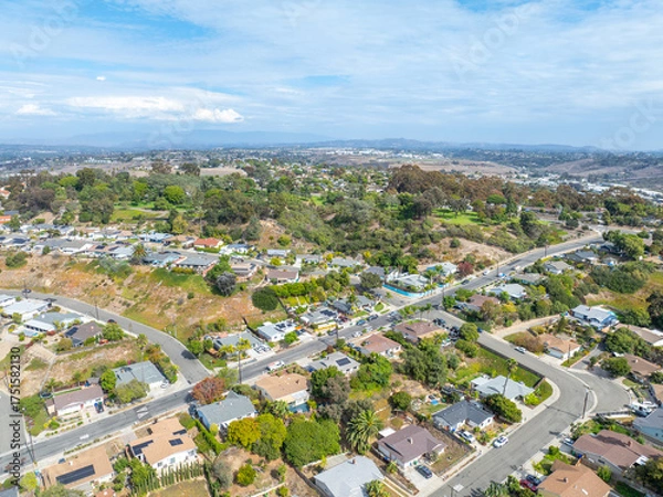 Fototapeta Aerial view of middle class houses in the valley of Oceanside town in San Diego, California. USA.