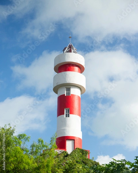 Obraz Red and white lighthouse in El Cuyo, a fishing village in Yucatan, Mexico.