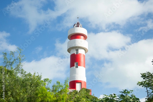 Obraz Red and white lighthouse in El Cuyo, a fishing village in Yucatan, Mexico.