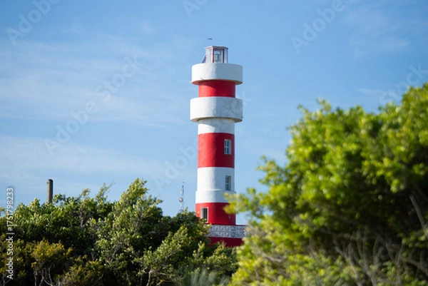 Obraz Red and white lighthouse in El Cuyo, a fishing village in Yucatan, Mexico.