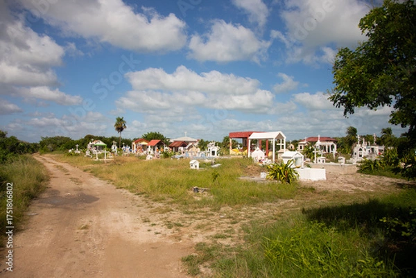 Obraz El Cuyo, Mexico; November 1, 2025: Cemetery next to the beach in El Cuyo, a fishing village in Yucatan.