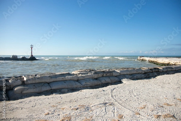 Obraz El Cuyo, Mexico; November 1, 2025: Entrance to the sea of ​​the port of a fishing village in Yucatan.