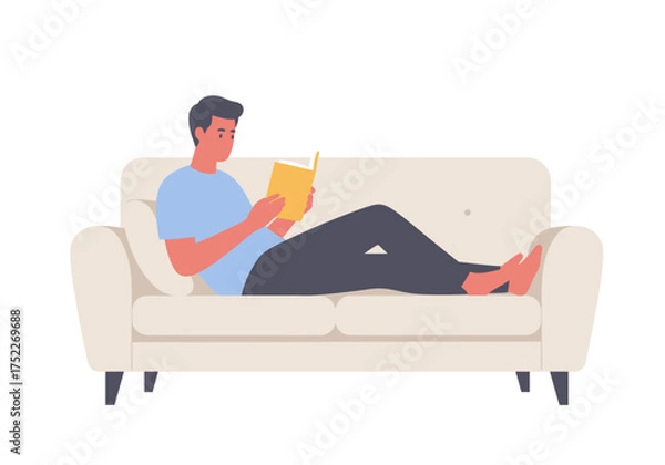 Fototapeta A man reclines on a sofa, engrossed in reading a book, enjoying leisure time.