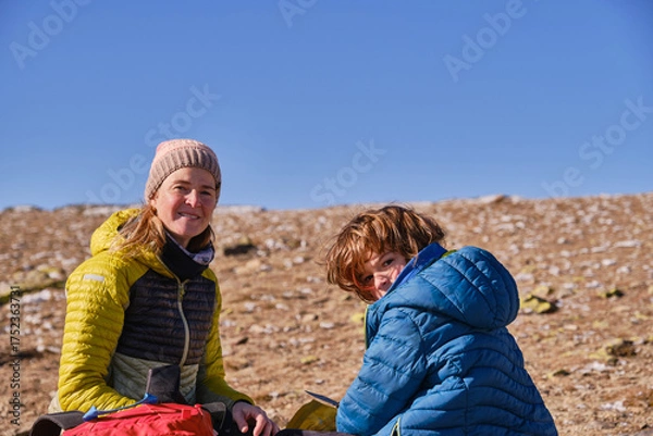 Obraz Portrait of a mother and her son resting in the mountains