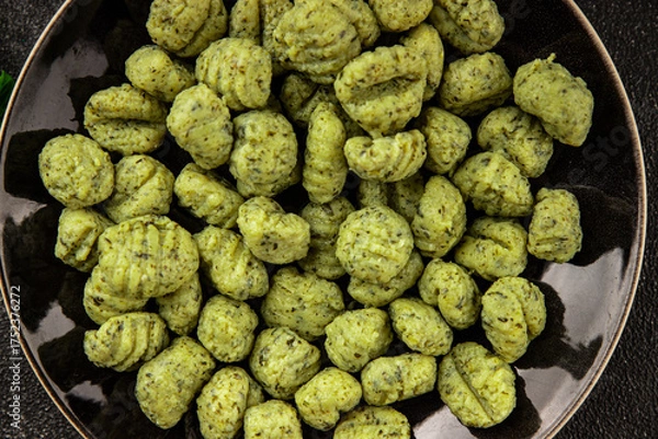 Fototapeta Gnocchi spinach potato dough second course portion size natural product tasty snack fresh delicious gourmet food background on the table rustic top view copy space
