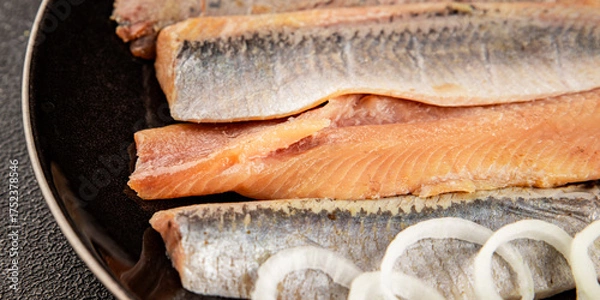 Fototapeta Herring fillet fish fresh seafood portion size natural product tasty snack fresh delicious gourmet food background on the table rustic top view copy space pescetarian diet