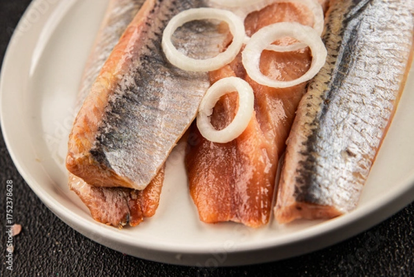 Fototapeta Herring fillet fish fresh seafood portion size natural product tasty snack fresh delicious gourmet food background on the table rustic top view copy space pescetarian diet