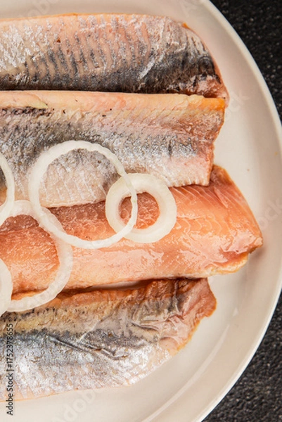 Fototapeta Herring fillet fish fresh seafood portion size natural product tasty snack fresh delicious gourmet food background on the table rustic top view copy space pescetarian diet