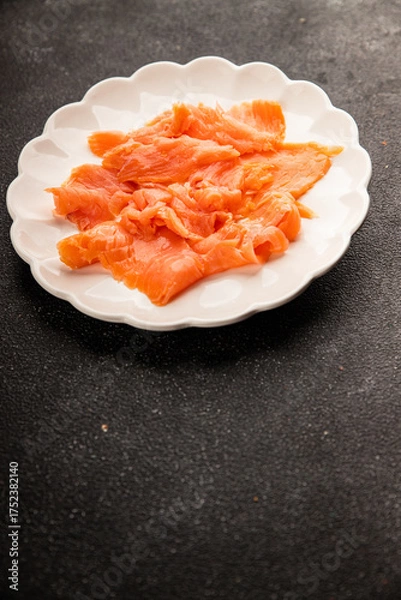 Fototapeta Smoked salmon fish seafood portion size natural product tasty snack fresh delicious gourmet food background on the table rustic top view copy space pescetarian diet