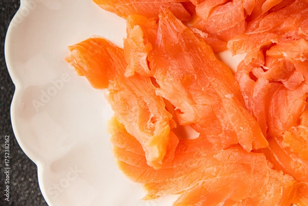 Fototapeta Smoked salmon fish seafood portion size natural product tasty snack fresh delicious gourmet food background on the table rustic top view copy space pescetarian diet