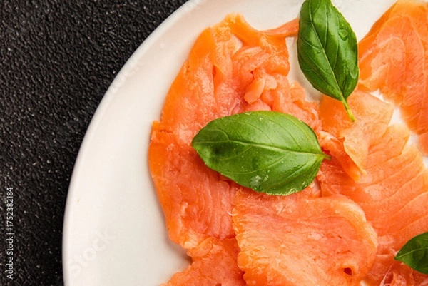 Fototapeta Smoked salmon fish seafood portion size natural product tasty snack fresh delicious gourmet food background on the table rustic top view copy space pescetarian diet